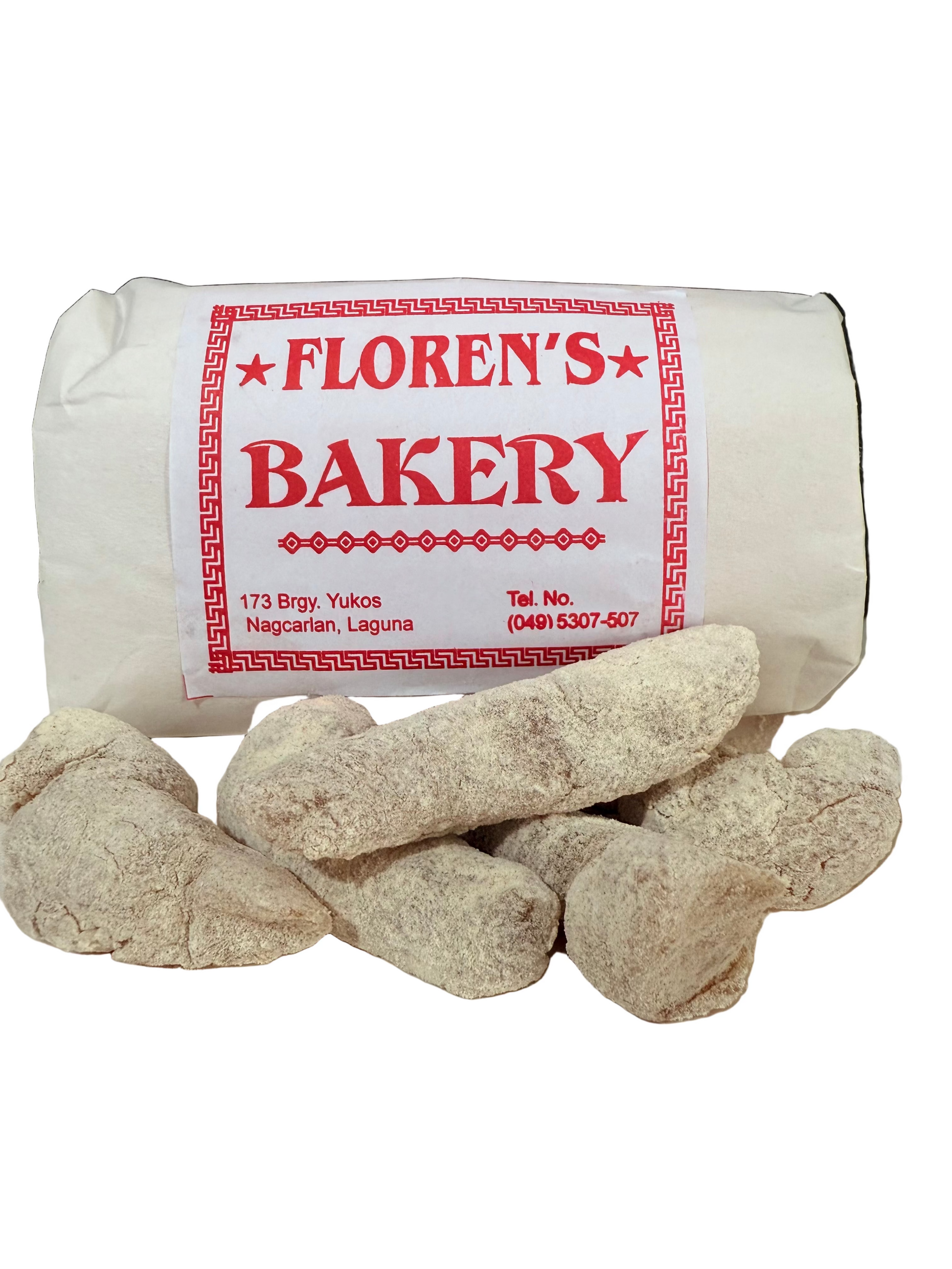 Roll of dough with 'Floren's Bakery' label on a white surface